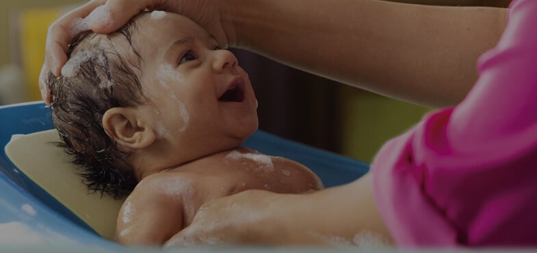 baby bath ritual for multisensorial stimulation through direct skin-to-skin contact