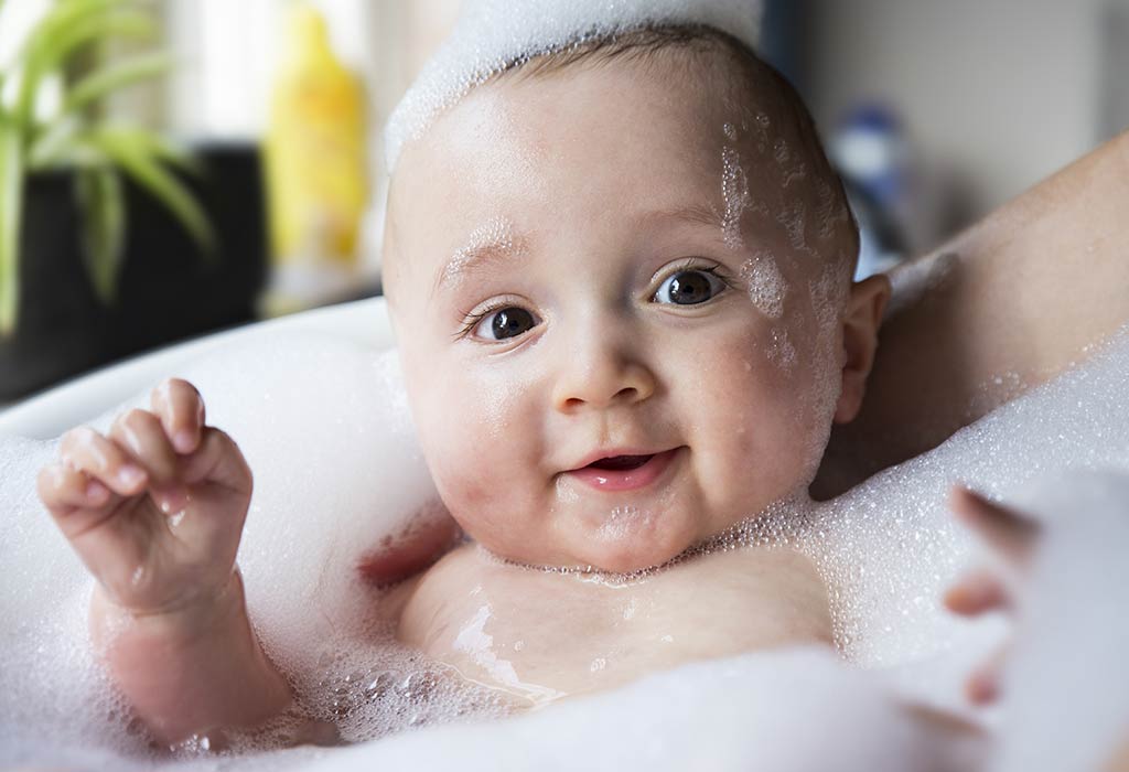baby's hair being washed with baby shampoo